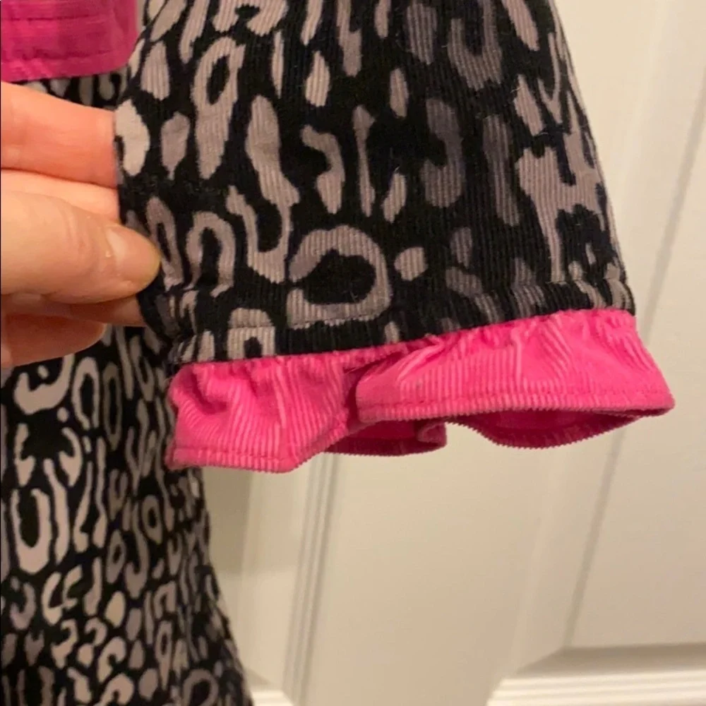 Leopard jacket with pink details. Size 4 toddler